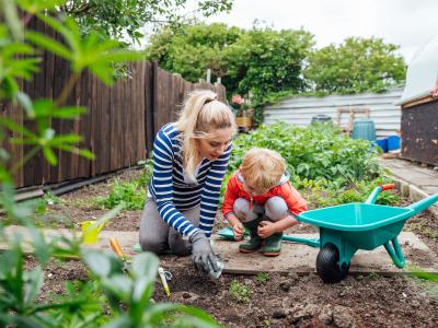 A mother and child garden together